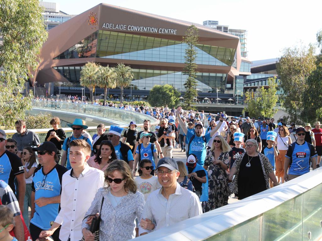 Fans arrive for the BBL game between the Strikers and the Scorchers at the Oval. Picture Dean Martin