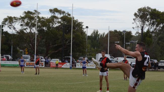 Flynn Walker kicks the winning point on Saturday. Picture: Facebook