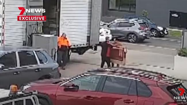 Three NSW removalists at the Ariele Apartments, the cause of the current Covid-19 outbreak in Victoria. Source: 7News