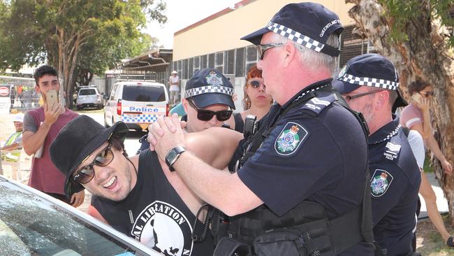 Black Swan Lake protest at Bundall goes to another level, with protesters chaining themselves to the fence and then getting themselves arrested after running onto the worksite and stopping the trucks. Protester known only as 