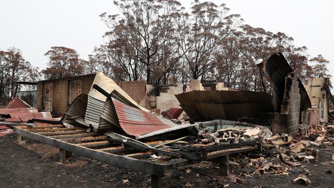 The home of Troy Pauling’s parents where RFS firefighters John Gallagher and Nathan Barnden rescued his family on New Year’s Eve. Picture: Jonathan Ng