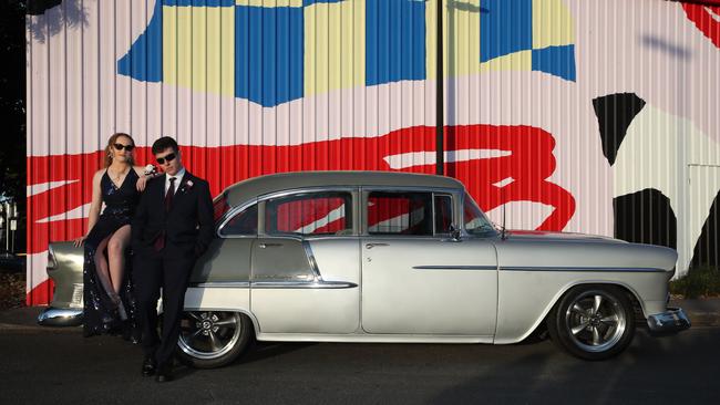 Robina State High School Year 12 formal at HOTA. Hannah Dalton and Samuel Green arrive in a Cheviot Bel Air. Picture: Glenn Hampson.