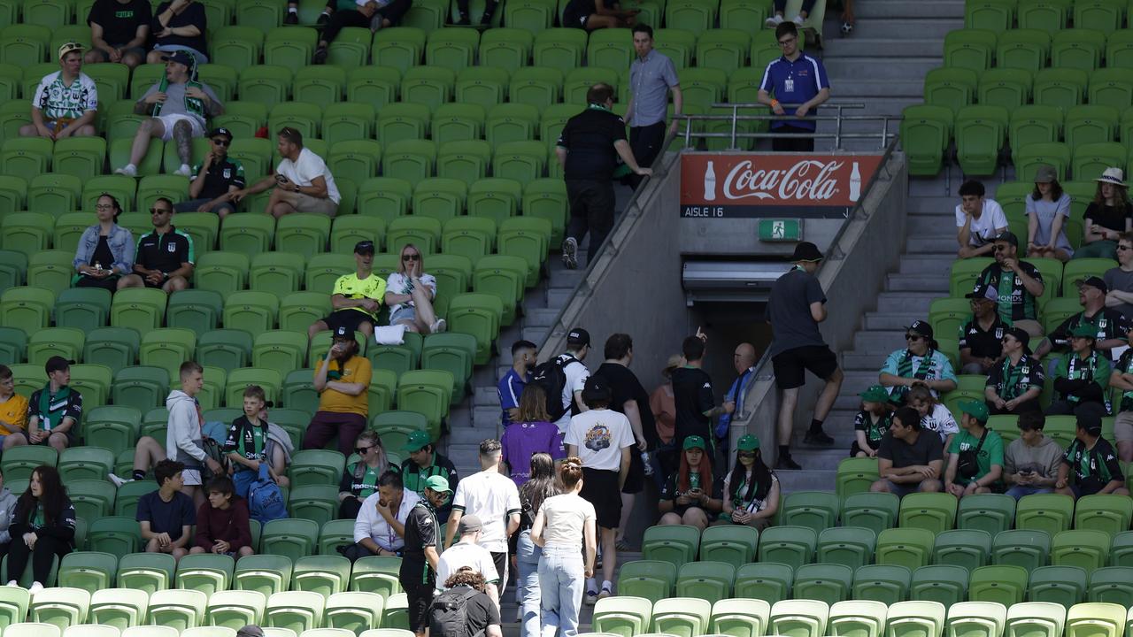 Protesting fans leave AAMI Park on Sunday after 20 minutes. Picture: Jonathan DiMaggio/Getty Images