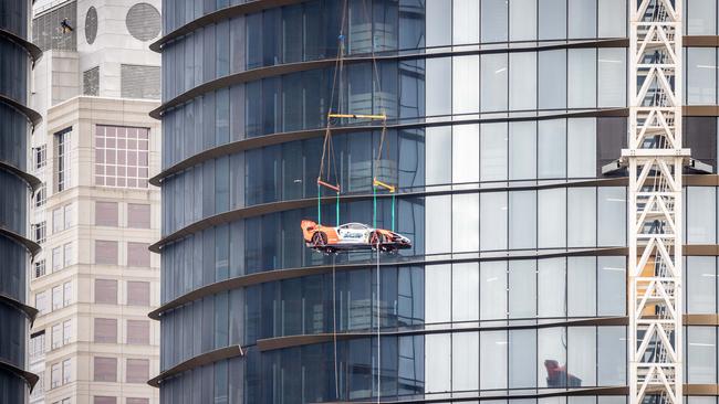 The McLaren Senna GTR on its way up to the 58th floor. Picture: Jake Nowakowski