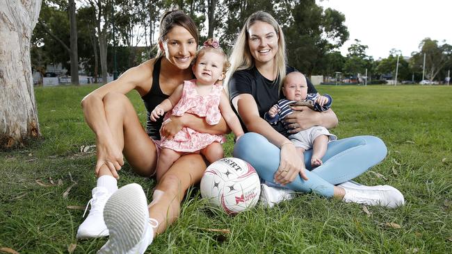 Kim Ravaillion with daughter Georgie and Gretel Bueta with son Bobby at Hawthorne. Picture: Josh Woning