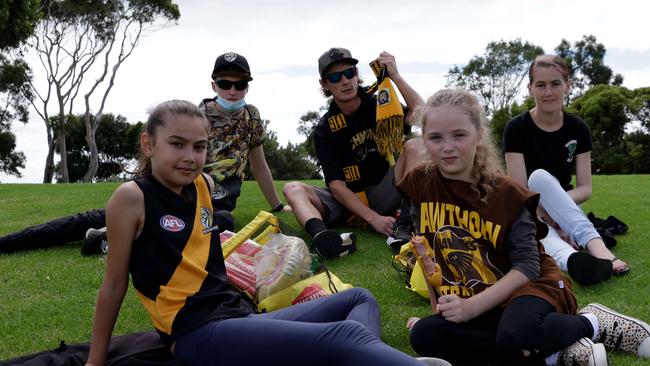 Front L-R Hayley Ablett, Trinity Loone Back L-R Connor Gallagher, Wally and Kellie Ablett at Hillcrest tribute game between Richmond and Hawthorn at Devonport. Picture: Grant Viney