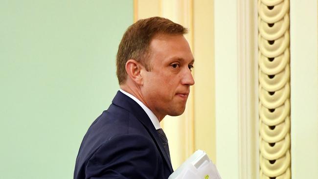 Health Minister Steven Miles leaves the chamber at state parliament. (AAP Image/Dan Peled) 