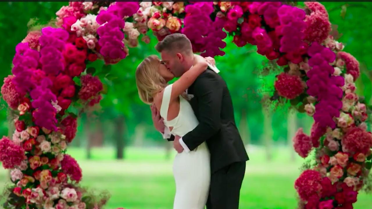 This flower archway will have a longer lifespan than their relationship.