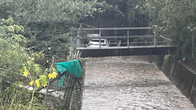 The car which veered off the Cumberland Highway and into a stormwater canal. Picture: David Meddows