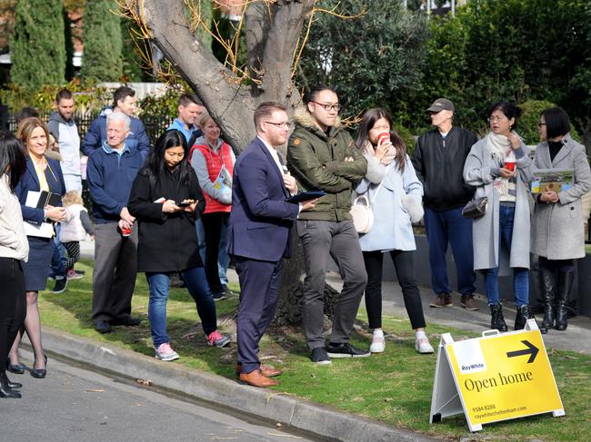 Crowds gather for the auction of 39 Donald St, Highett. Picture: Andrew Henshaw