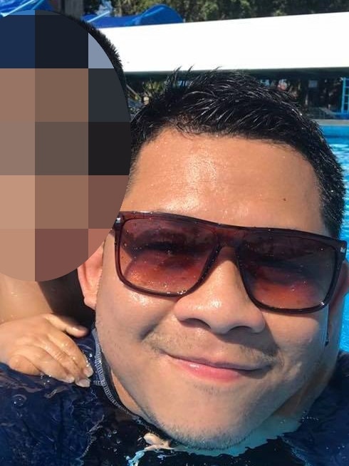 Paedophile Ruecha Tokputza with a child at a swimming pool. Some of his offences were committed in swimming centre change rooms.