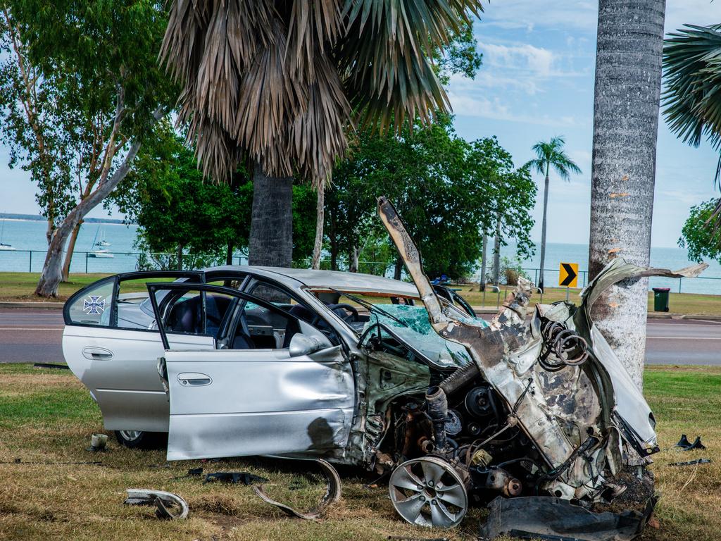 Locals and tourists amaze at a spectacular single vehicle car crash on East Point Rd just outside of the Fannie Bay Gaol. Picture: Glenn Campbell