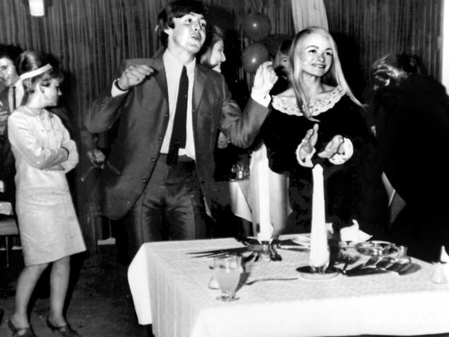 Paul McCartney member of band “The Beatles” celebrates his birthday in Sydney with Delphine Morrisey (R) and other fans during their Australian tour in 1964. Picture: News Corp
