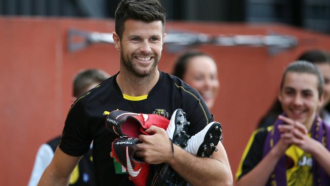 Richmond captain Trent Cotchin arrives in good spirits for the first day of pre-season training. Picture: Michael Klein