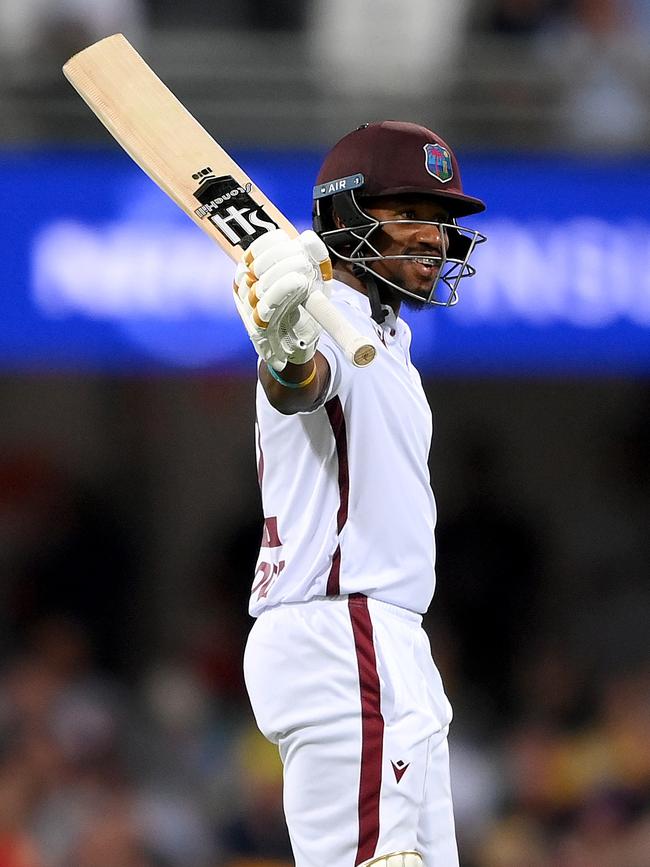 Kavem Hodge celebrates after scoring a half century. (Photo by Bradley Kanaris/Getty Images)