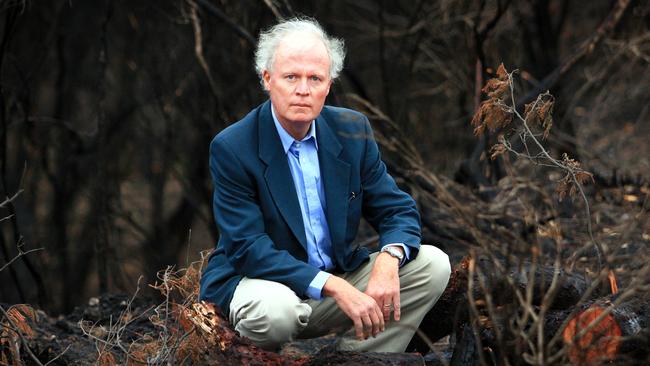 Consultant psychologist Dr Rob Gordon amid the ruins of Yarra Glen in the aftermath of the Black Saturday fires in Victoria.