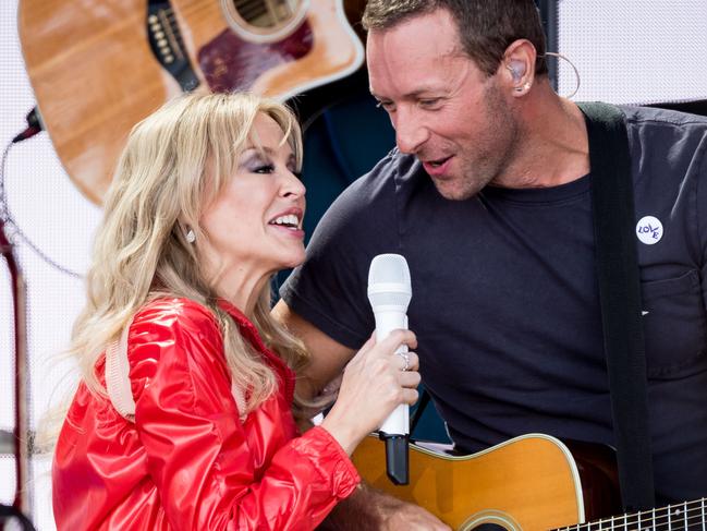 Kylie Minogue and Chris Martin of Coldplay sing Can’t Get You Out of My Head. Picture: Getty.