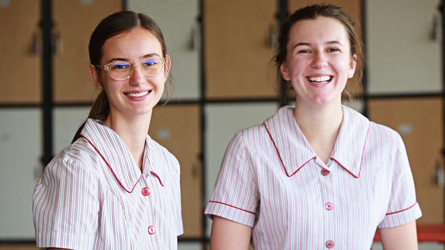 One exam down: Ali Godbier, 18 and Grace Kendall, 17, at Stella Maris College. Picture: Adam Yip. Daily