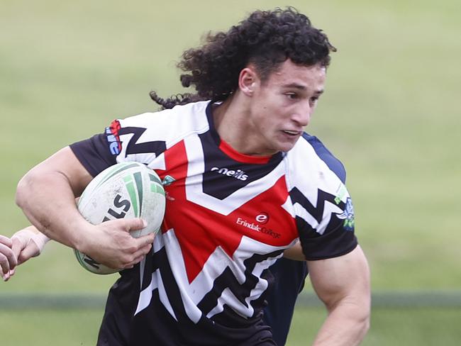 DAILY TELEGRAPH 22ND JUNE 2023Pictured busting a tackle with the ball is Erindale High player Blake Hovi during a 2023 NSW Schoolboys Cup round between Matraville Sports High v Erindale High at Pioneers Park in Malabar.Picture: Richard Dobson