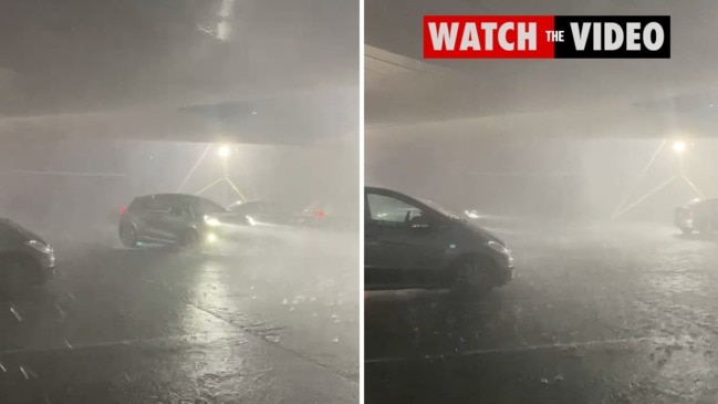 Rain lashes shopping centre at Southport