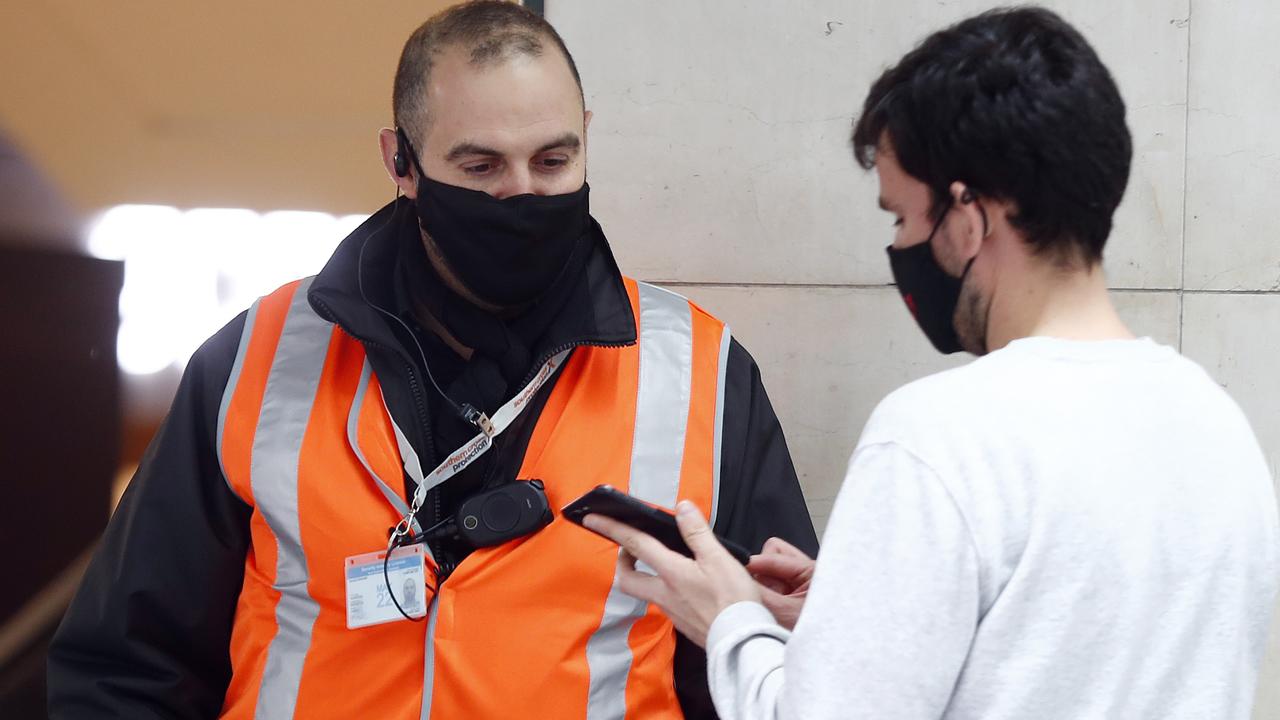 Security outside Myer checks QR and vaccine confirmation. Picture: Sam Ruttyn