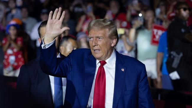 Donald Trump back on the campaign trail in Flint, Michigan, following the weekend attempt on his life. Picture: Getty Images.