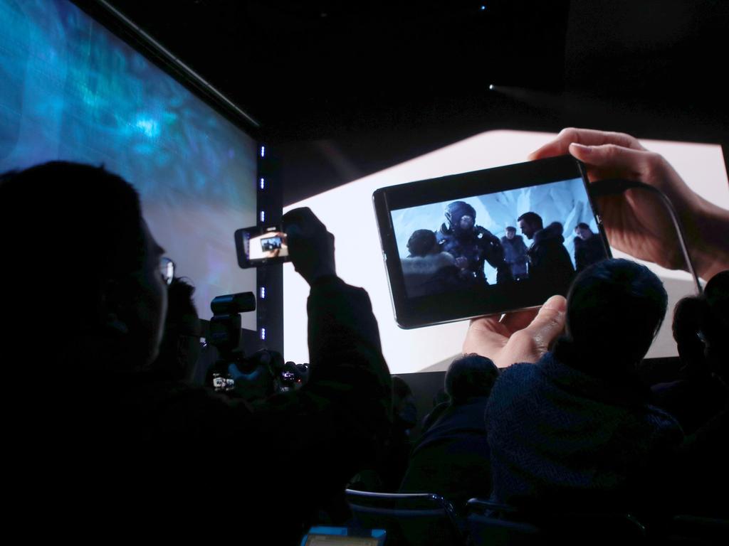 Attendees watch a demonstration of the new Samsung Galaxy Fold smartphone. Picture: Justin Sullivan