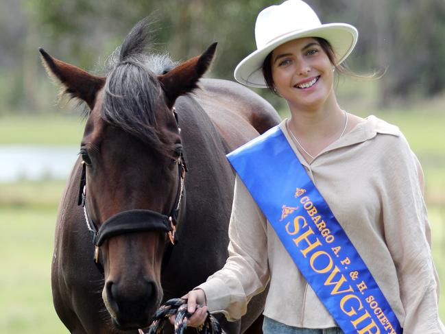 WEEKEND TELEGRAPHS SPECIAL. MUST TALK WITH PIC ED JEFF DARMANIN BEFORE PUBLISHING - Pictured on a farm in High Range today is Easter Show Girl Carmen Macgregor. Picture: Tim Hunter.