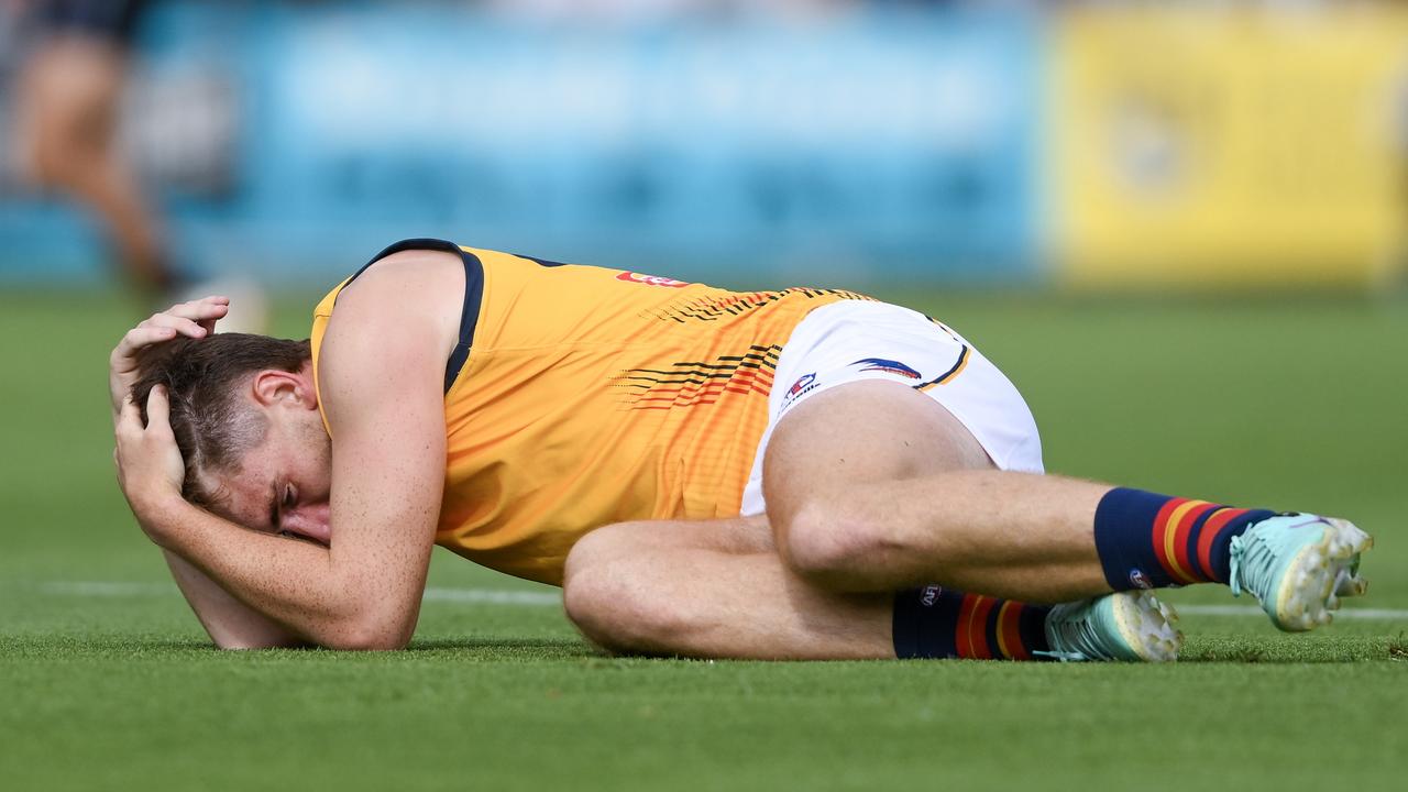 Mark Keane reacts after the heavy hit. Picture: Mark Brake/Getty Images