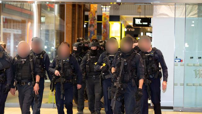 Armed police at Westfield Marion during the June lockdown. Picture: Brett Hartwig