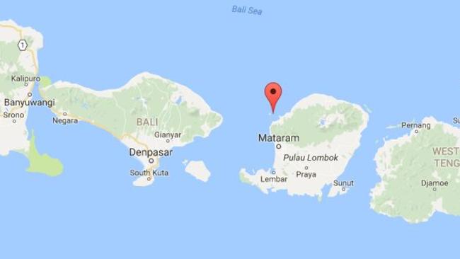 A Contiki bus was en route to the Gili Islands when it fell off a cliff, killing at least one tourist.