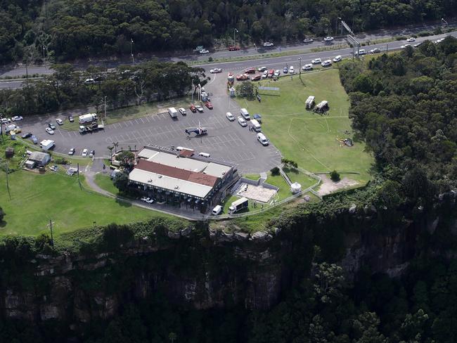 Emergency services are at the scene of the fatal helicopter crash at Bulli Tops.