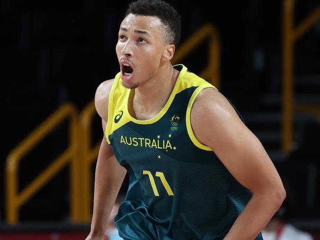 SAITAMA, JAPAN - AUGUST 07: Dante Exum #11 of Team Australia celebrates against Team Slovenia during the second half of the Men's Basketball Bronze medal game on day fifteen of the Tokyo 2020 Olympic Games at Saitama Super Arena on August 07, 2021 in Saitama, Japan. (Photo by Kevin C. Cox/Getty Images)