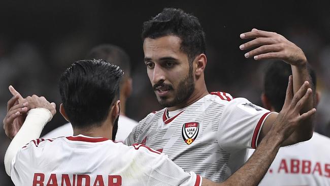 Ali Mabkhout al Hajeri, right, celebrates with his teammate Bandar al Ahbabi after scoring. Picture: AP