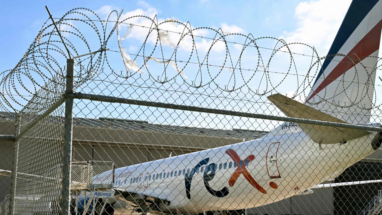 A Rex Airlines Boeing 737 sits on the tarmac at Melbourne's Tullamarine Airport on Tuesday. Picture: AFP