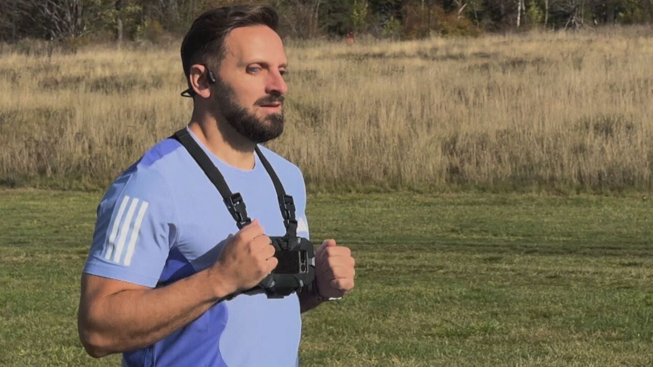 Freedom to run: Blind athlete guided by AI technology