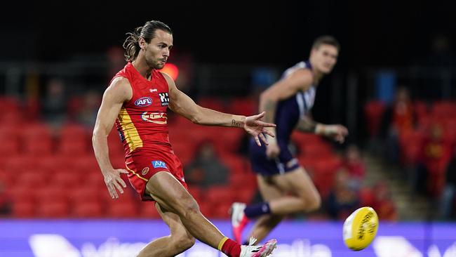 Lachie Weller of the Suns during the Round 4 AFL match between the Gold Coast Suns and the Fremantle Dockers. (AAP Image/Dave Hunt)