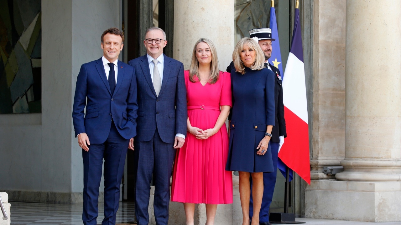 PARIS, FRANCE - JULY 01: (L to R) French President Emmanuel Macron, Australian Prime Minister Anthony Albanese, his spouse, Jodie Haydon and French First Lady Brigitte Macron pose for a picture prior to their meeting at the Elysee Presidential Palace on July 01, 2022 in Paris, France. This meeting constitutes the first official meeting between the two leaders since the investiture at the end of May of Anthony Albanese. Relations between the two countries had been at their lowest since the cancellation in the fall by Canberra of a gigantic contract of 56 billion euros, relating to twelve submarines, for the benefit of nuclear-powered buildings as part of the partnership the so-called Aukus Agreement with the United States. (Photo by Chesnot/Getty Images)