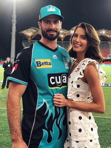 Brisbane Heat star Ben Cutting and former Miss World Australia Erin Holland at Metricon Stadium on the Gold Coast this week.