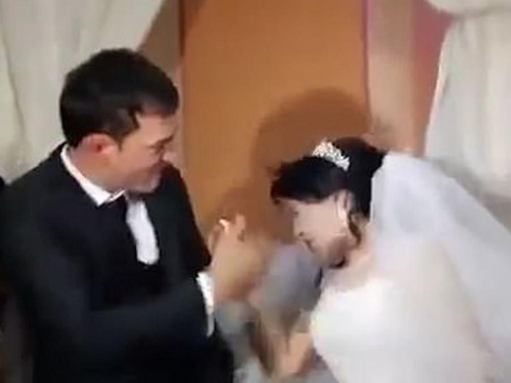 A groom has been labelled “disgusting” by outraged social media users after a video emerged of him slapping his bride on their wedding day.