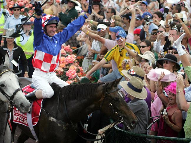 Boss celebrates Makybe Diva’s historic third Melbourne Cup win.