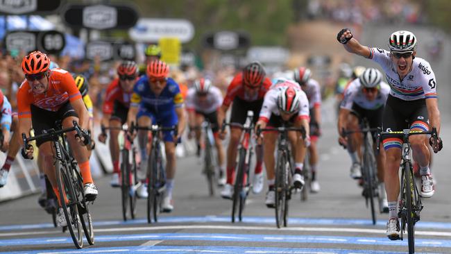 CAMPBELLTOWN, AUSTRALIA - JANUARY 18: Arrival / Daryl Impey of South Africa and Team Mitchelton-Scott / Celebration / Patrick Bevin of New Zealand and CCC Team Orange Leader Jersey / during the 21st Santos Tour Down Under 2019, Stage 4 a 129,2km stage from Unley to Campbelltown / TDU / on January 18, 2019 in Campbelltown, Australia. (Photo by Tim de Waele/Getty Images)