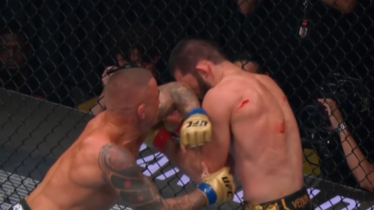 Dustin Poirier lands an elbow on the champ