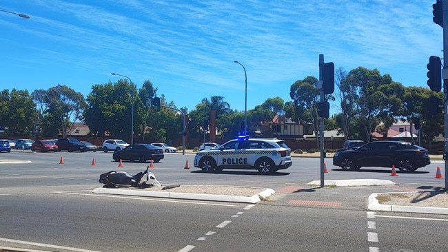 Emergency services were called about 12.50pm on Saturday to the crash between an car and a scooter.