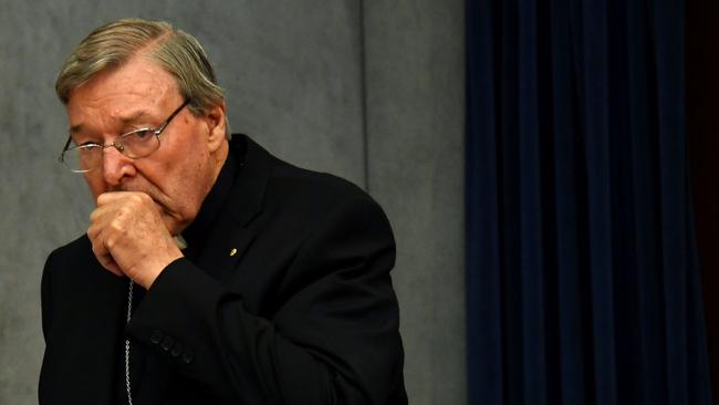 Cardinal George Pell gestures as he makes a statement at the Holy See Press Office, Vatican City on June 29, 2017 after being charged with historical child sex offences. Picture: Alberto Pizzoli/AFP