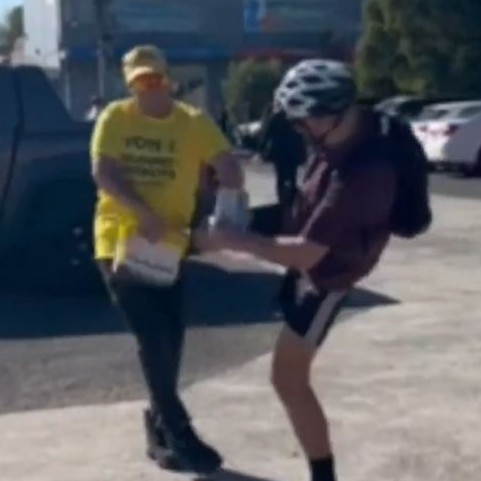 A Trumpet of Patriots volunteer has been punched and kicked at a Melbourne pre-poll both ahead of Saturday’s federal election, in a disturbing incident captured on video. Credit: Rukshan Fernando