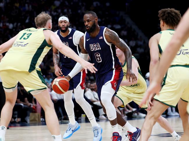 ABU DHABI, UNITED ARAB EMIRATES - JULY 15: LeBron James #6 of the United States dribbles the ball up the court during the second half of an exhibition game between the United States and Australia ahead of the Paris Olympic Games at Etihad Arena on July 15, 2024 in Abu Dhabi, United Arab Emirates. (Photo by Christopher Pike/Getty Images)