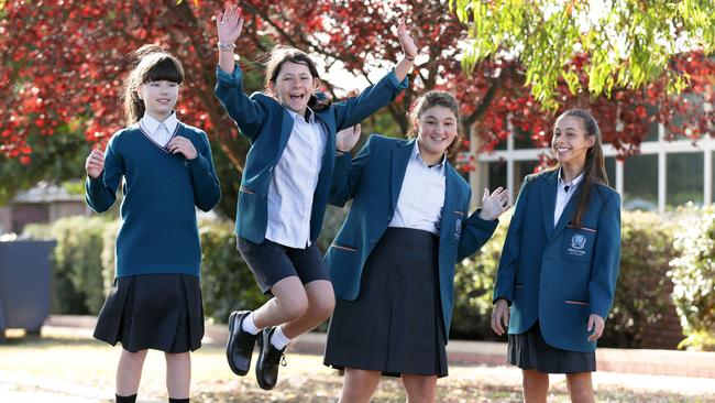 Students Harriet, Peta, Nikita and Alyssa were jumping for joy at the new Preston High School. Picture: George Salpigtidis