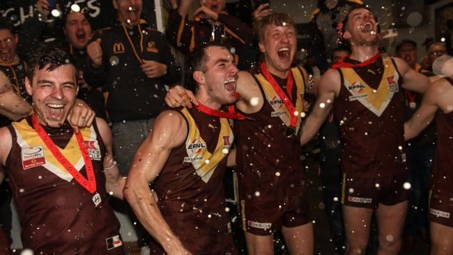 The Hawks celebrate in the rooms afterwards. Picture: Davis Harrigan