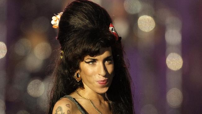 A new book featuring private jottings and scribbles from Amy Winehouse’s diaries offer a window into the furnace that was her soul. Picture: AFP